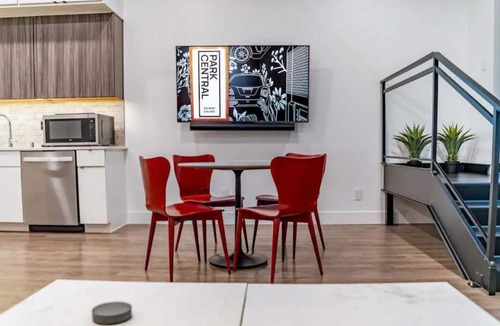 Appleton Apartment | Downtown! Brand New, Modern, Massive Studio with Kitchen + Game Room & Theater.