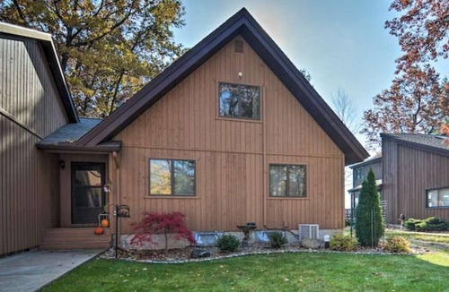 Gladwin Ski Chalet | Dream Cottage w/ Sandy Beach, Dock, Pontoon Rental