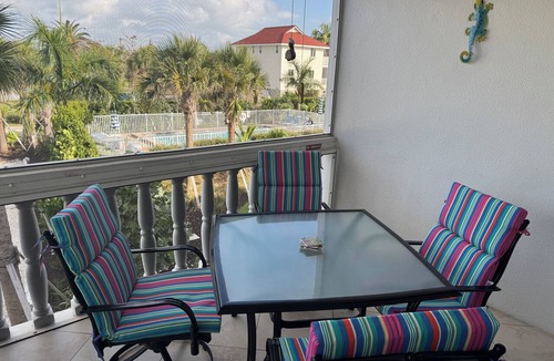 Sanibel Condo | End unit with extra windows. Steps to the beach, private beach access!