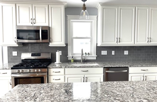 Beulah House | Enjoy Crystal Lake's pristine water and amazing sunsets from this lakefront home