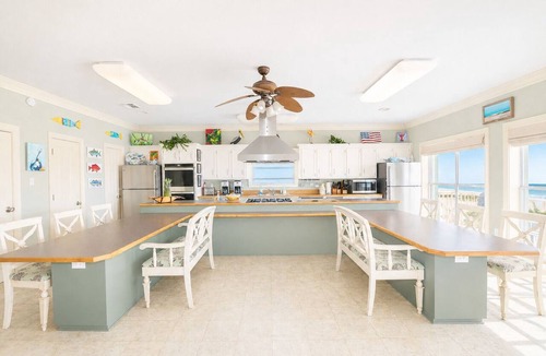 Grand Isle House | Experience beachfront luxury at Orange Beach Retreat in Grand Isle, LA, perfect for 16 guests.