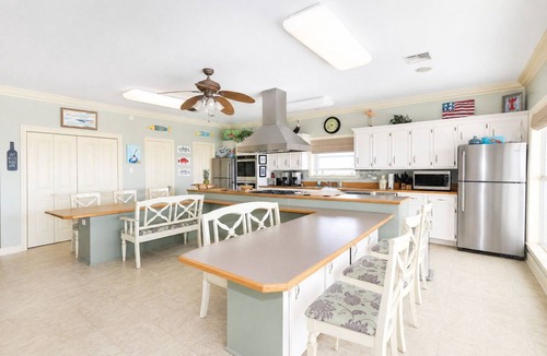 Grand Isle House | Experience beachfront luxury at Orange Beach Retreat in Grand Isle, LA, perfect for 16 guests.
