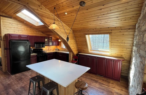 Birchwood Cabin | Family friendly home for quiet retreats. 6 bed lodge on quiet lake near trails