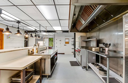 Presque Isle Cabin | Full hotel with bar, commercial kitchen, pool table & fireplaces - dog-friendly