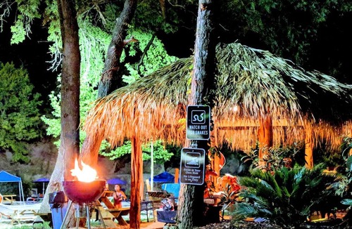 Prairie Lea RV Rental | Fully-Equipped Riverside Glamping Safari Tent on the San Marcos River, Texas