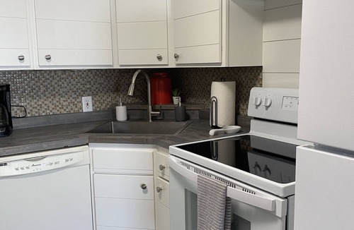 Ogallala House | Fun MidMod home remodeled with private back yard.