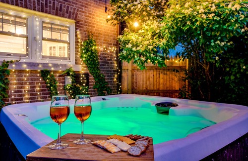 Northshore Triangle House | Golden Dome Getaway: Hot Tub, Cinema, Fire Pit!