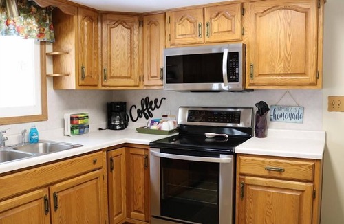 Escanaba House | Greenwood Getaway: Your Summer Escape to Lake Michigan Adventures