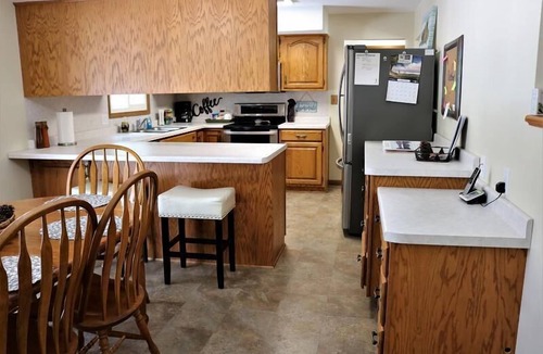 Escanaba House | Greenwood Getaway: Your Summer Escape to Lake Michigan Adventures