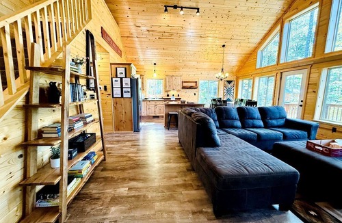 Stone Lake Cabin | Group Lake Cabin with Ping Pong Table Loaded with Kayaks in Wisconsin