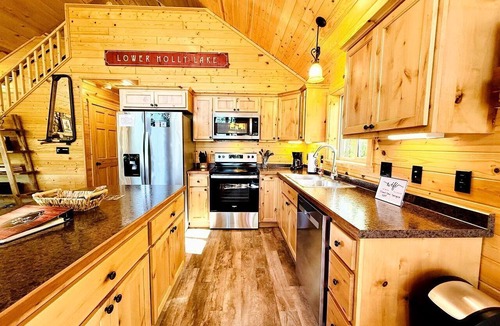 Stone Lake Cabin | Group Lake Cabin with Ping Pong Table Loaded with Kayaks in Wisconsin