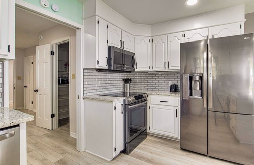 Gulf Breeze House | Gulf Breeze Bayfront Bliss - Private Dock - Sleeps 12 - Pet-Friendly with Views