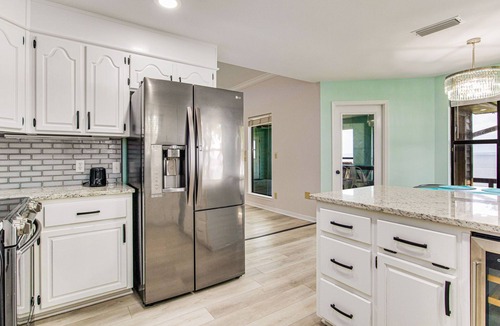 Gulf Breeze House | Gulf Breeze Bayfront Bliss - Private Dock - Sleeps 12 - Pet-Friendly with Views