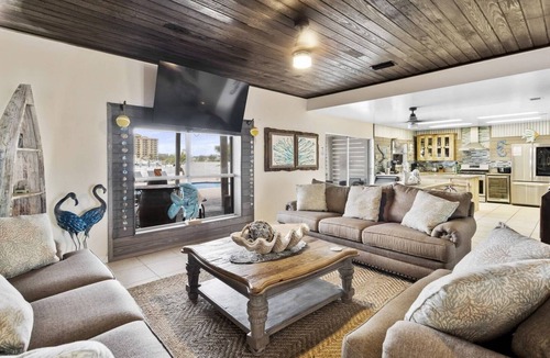 Holiday Isle House | Harborfront Home with Pool, Dock & Tiki Cruise