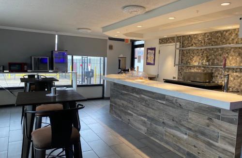Pines Village Hotel | Hotel 10 Extended Stay