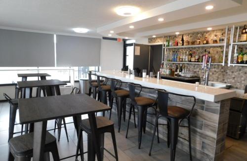 Pines Village Hotel | Hotel 10 Extended Stay