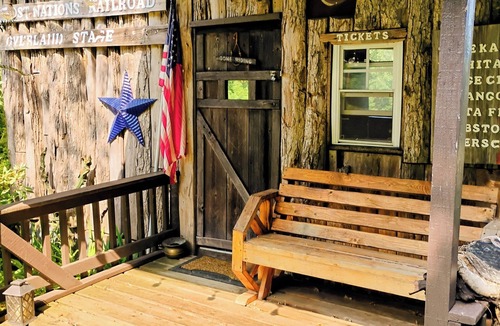 Frontier Cabin | Hunting Cabin Rustic Handcrafted primitive sits in our unique rustic Cowboy Town