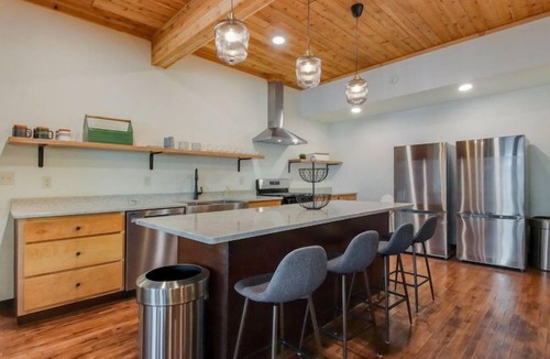 Jim Falls Cabin | Hygge Lodge is a gorgeous lakefront gathering place for year round family fun.