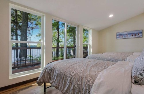 Jim Falls Cabin | Hygge Lodge is a gorgeous lakefront gathering place for year round family fun.