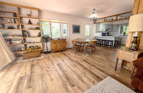 Indian River Cottage | Incredible lakefront house with cottages, dock, fire pit, decks, & amazing views