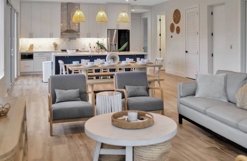 Pirates Cove House | Keys Casa: Elegant Waterfront Retreat, Sleeps 16, Elevator, Private Dock, Putt-Putt