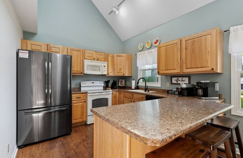 Paw Paw Lake House | Lake Front, Hot Tub, Game Room, Kayak/SUPs, Firepit, Pet Friendly