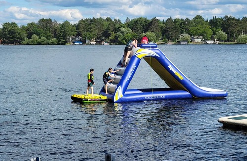 Arbor Vitae Cabin | Lakefront Cabin with private dock, community firepit, with kayaks & paddleboards