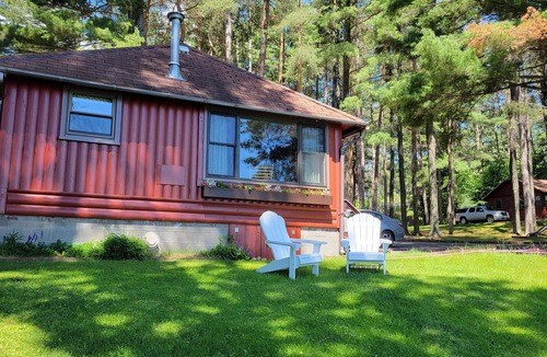 Arbor Vitae Cabin | Lakefront Cabin with private dock, community firepit, with kayaks & paddleboards
