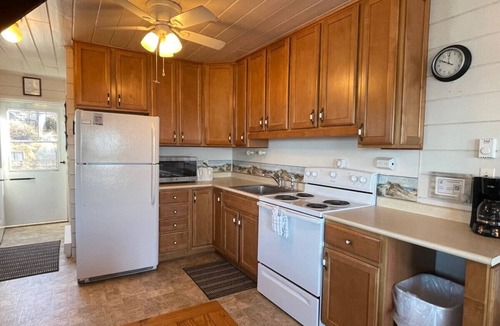 Stevensville House | Lakefront Chalet #20 w/Beach Access, Pools, Sport Courts, Fishing Pond & more!