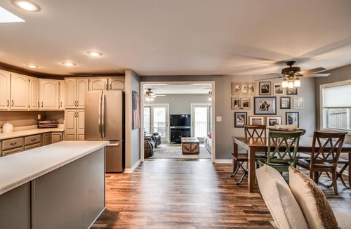 Delton House | Lakefront Family Cottage Sandy Beach Panoramic Michigan Sunsets