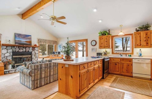 Manitowish Waters House | Lakefront haven with three living areas and WiFi