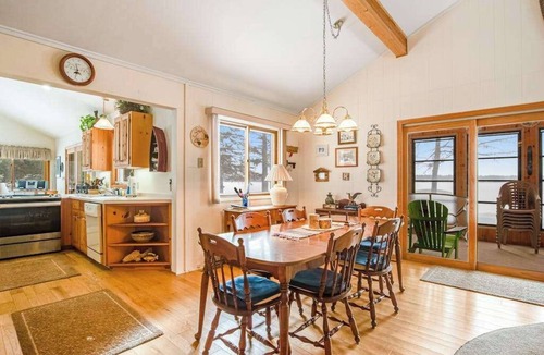 Manitowish Waters House | Lakefront haven with three living areas and WiFi