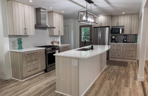 Wolf Lake House | Lakefront Oasis: kayaks, game garage, fire pit, 2 kitchens, sleeps 16