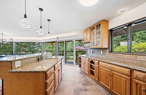 Saunders Lake House | Lakefront Octagon Hot Tub Wine Bar Game Room