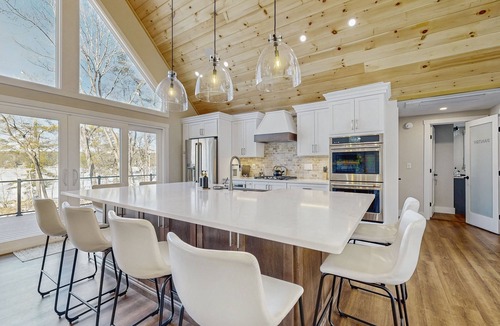 Gray House | Lakefront properties with private beach, hot tub, dock, kayaks, grill & firepit