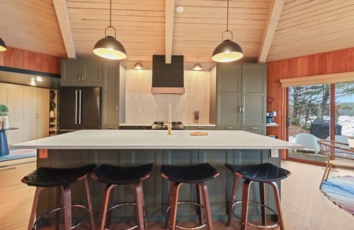 Eagle River Cabin | Lakefront Retreat with Sandy Beach, Swim Area & Relaxing Lakeside Seating!