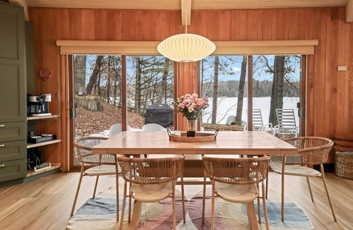 Eagle River Cabin | Lakefront Retreat with Sandy Beach, Swim Area & Relaxing Lakeside Seating!