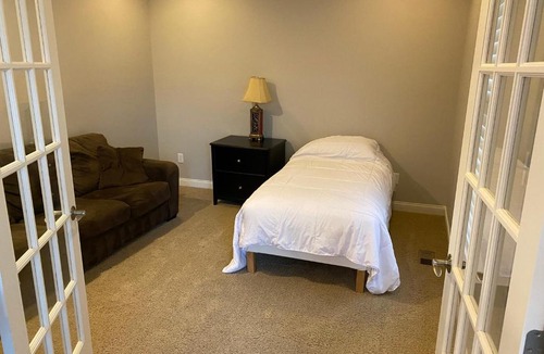 Maxwell House | Lakefront view private bedroom and bathroom with kitchen