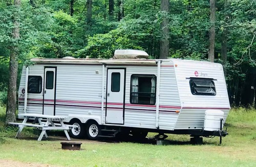 Irons RV Rental | Large sites! Full hookup drive thru campsite 70 ft