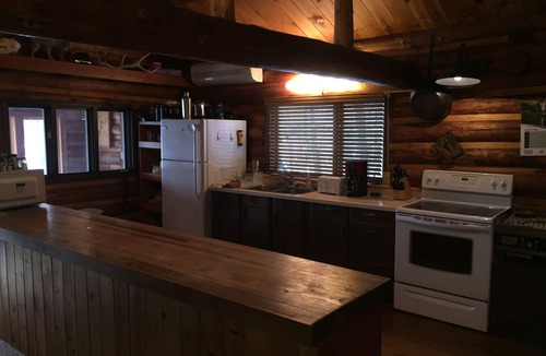 Winter Cabin | Log cabin on beautiful clear lake perfect for your family retreat.