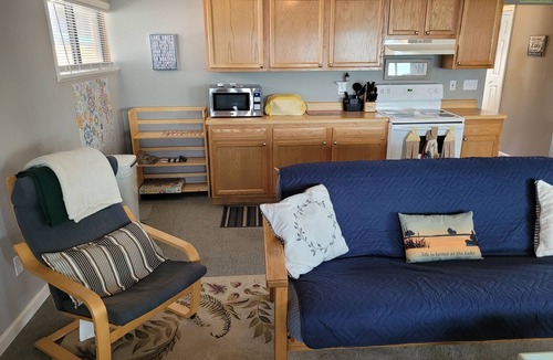 Oscoda Cottage | Loon Lodge - Super Cute, Lakefront, Bonfire Ring, and Private Dock!