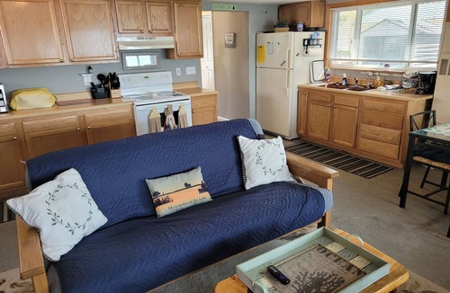 Oscoda Cottage | Loon Lodge - Super Cute, Lakefront, Bonfire Ring, and Private Dock!