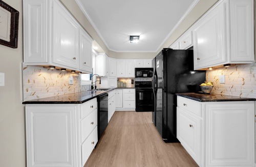 Allenton House | Luxury Farmhouse on 20 Acres with Pond, Waterfall & Game Room