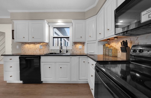Allenton House | Luxury Farmhouse on 20 Acres with Pond, Waterfall & Game Room