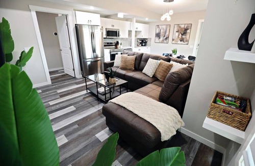 Southeast Calgary Condo | Mahogany Lakefront 2BR Walkout | Trails & Privacy