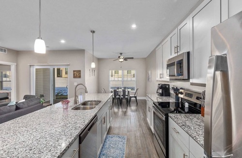 Grandville Condo | Modern 2BR + 2BA Condo with Garage & Patio