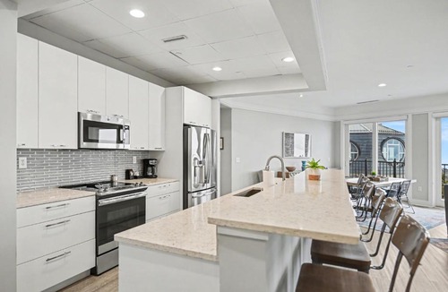 Bay Harbor Apartment | Modern Bliss 466: Luxurious 3BR condo in Bay Harbor with stunning lake views.