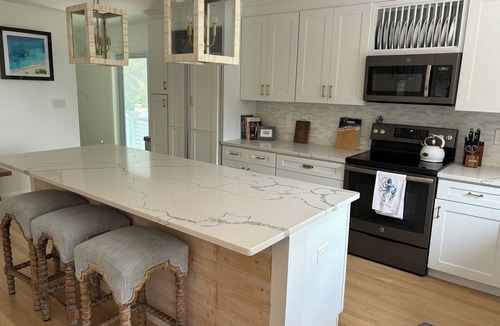 Haversham House | Modern coastal retreat w/pool, close to beaches and golf courses.