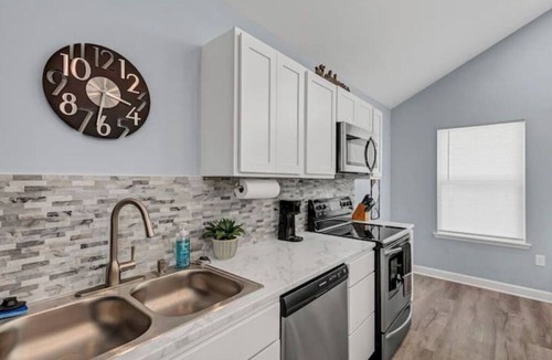 Morrilton House | Modern Couples Retreat . Lakefront . Private Dock
