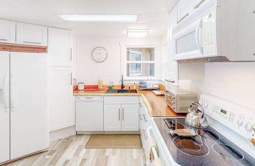 Blue River Cabin | Modern dog-friendly cabin with private deck, foosball, grill, AC, & W/D
